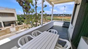 Un balcón o terraza en 059 e 060 Spiaggia di SalentoinVacanza.Com