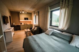 Ένα ή περισσότερα κρεβάτια σε δωμάτιο στο Chalet OSHI Jasna