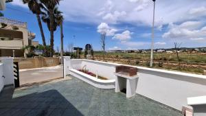 Un balcón o terraza en 059 e 060 Spiaggia di SalentoinVacanza.Com