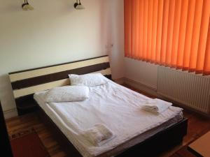 Postel nebo postele na pokoji v ubytování Hotel Romantik