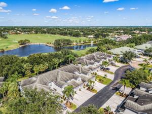 an aerial view of a park with a lake and trees at Relaxed Golfside Living with New Furnishings & Scenic Views - Palm Breeze Fairway in Gateway