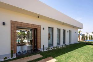 Κήπος έξω από το Villa B Marrakech chambres d hôtes Piscine Zéro vis-à-vis