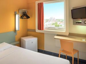 Postel nebo postele na pokoji v ubytování ibis budget Belem + 49 fotografií