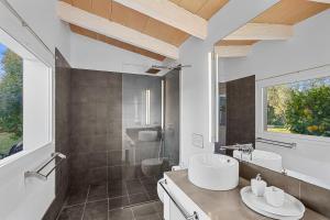 a bathroom with a sink and a toilet at Chalet Las Canas in Santa Maria del Camí +36 photos