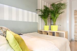Posteľ alebo postele v izbe v ubytovaní ActivPark Apartments