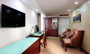 TV o dispositivi per l'intrattenimento presso New World Hotel