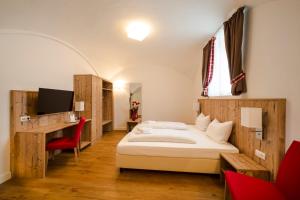 Postel nebo postele na pokoji v ubytování Hotel Hölzer Bräu by Lehmann Hotels