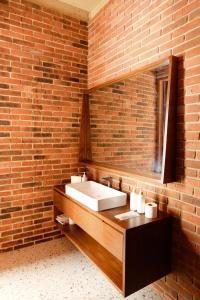 Koupelna v ubytování Pulojava Resort + 18 fotografií