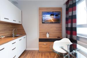Kuchyňa alebo kuchynka v ubytovaní ActivPark Apartments