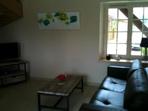 Televisyen dan/atau pusat hiburan di La Cense De La Mérelie - Le Fournil