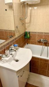 Koupelna v ubytování Arena + 6 fotografií