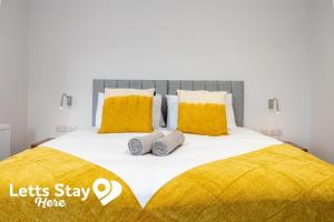 Ένα ή περισσότερα κρεβάτια σε δωμάτιο στο Morecambe Bay Stays +4 φωτογραφίες