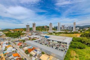 an overhead view of a city with tall buildings at Praia Brava - Central entre Itajaí e BC - 2 Qts e Ar in Itajaí