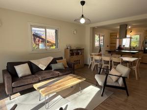 Posezení v ubytování Chalet La Huette