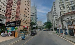 an empty street in a city with tall buildings at SHB - Studio in the Heart of Gonzaga by the Sea in Santos