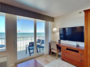 TV a/nebo společenská místnost v ubytování Harbour Beach Resort 505