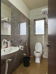 Koupelna v ubytování Nivaant Farms