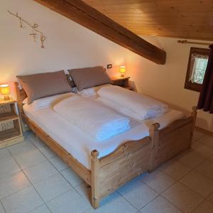 Postel nebo postele na pokoji v ubytování B&B Casa Zeni