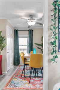 a dining room with a table and chairs at Cozy Oshkosh Home Minutes from UW, EAA & Downtown in Oshkosh