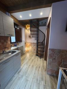 Kuchyň nebo kuchyňský kout v ubytování Pantaleone House 1