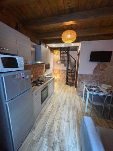 Kuchyň nebo kuchyňský kout v ubytování Pantaleone House 1