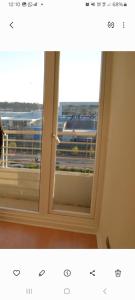 a picture of a window with a view at Céntrico Departamento Edificio Civic in El Cerrillo