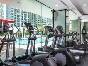 a row of cardio machines in a gym at Mercure Bangkok Sukhumvit 11 in Bangkok +92 photos