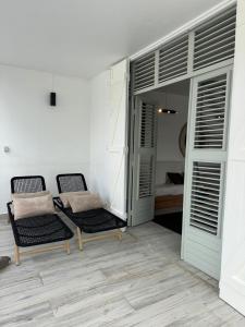 Χώρος καθιστικού στο Pointe Noire +9 φωτογραφίες