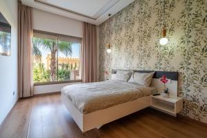 En eller flere senge i et værelse på Zen Villa Private Parking + 42 billeder