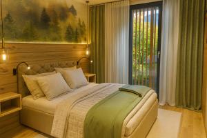 Postel nebo postele na pokoji v ubytování Ferienwohnung Tenne - Weissnhof