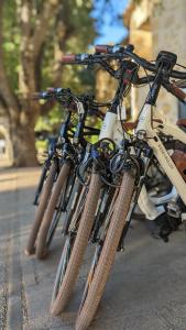 a group of bikes parked next to each other at Le Moulin, Lourmarin, a Beaumier Hotel in Lourmarin