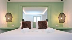 Postel nebo postele na pokoji v ubytování Unique Losone Apartment