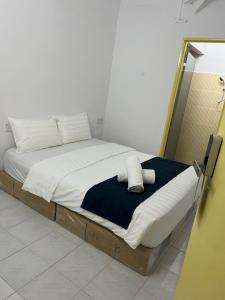Ένα ή περισσότερα κρεβάτια σε δωμάτιο στο Rest N Go CM