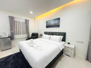 Ένα ή περισσότερα κρεβάτια σε δωμάτιο στο Tonjun residence samui