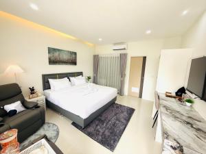 Ένα ή περισσότερα κρεβάτια σε δωμάτιο στο Tonjun residence samui +3 φωτογραφίες