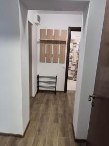 a hallway with a bench in a room at BVA&Studio 