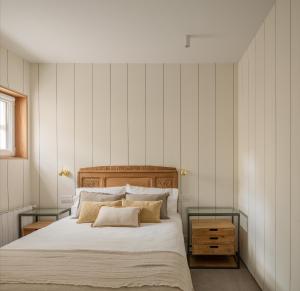 Postel nebo postele na pokoji v ubytování Neguri Apartment