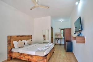 Ένα ή περισσότερα κρεβάτια σε δωμάτιο στο Hotel Albatross