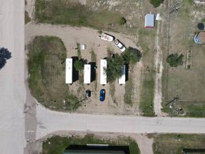 an overhead view of a parking lot with cars parked at Grasshopper Flats RV Pad in Interior +1 photo