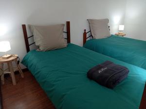 Postel nebo postele na pokoji v ubytování Villa au centre ville du Tampon