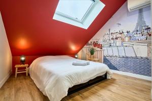 En eller flere senge i et værelse på Locations Tourcoing - Le Cassel