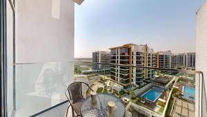 Bazén v ubytování Locations l Luxurious Studio l Free Pool, Gym Access l Meydan nebo v jeho okolí + 10 fotografií