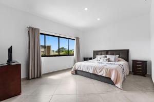 a bedroom with a bed and a large window at Casa Oasis B-Nayar Gated, Beach Club, Free Shuttle in Cruz de Huanacaxtle +48 photos