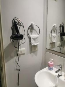 Koupelna v ubytování Departamento 1 dormitorio 1 baño cercano al aeropuerto