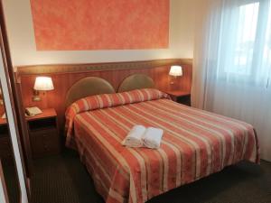 Postel nebo postele na pokoji v ubytování Hotel Kristall + 53 fotografií