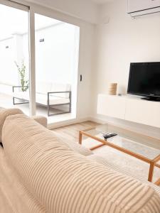 Телевизор и/или развлекательный центр в Casa Puerta del Valle