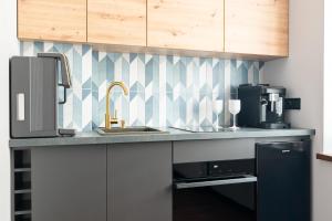 Una cocina o cocineta en Apartament Organza 19 fotos más