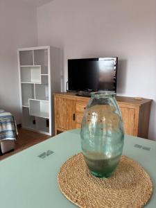 a glass vase sitting on top of a table at Vivienda Vacacional Nura in Lajares