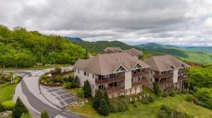 an aerial view of a large house in the mountains at SugarJax at The Reserve in Banner Elk