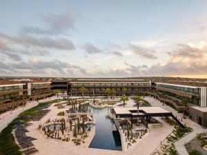 an aerial rendering of a resort with a marina at Secrets Baby Beach Aruba Adults Only in Ceru Colorado